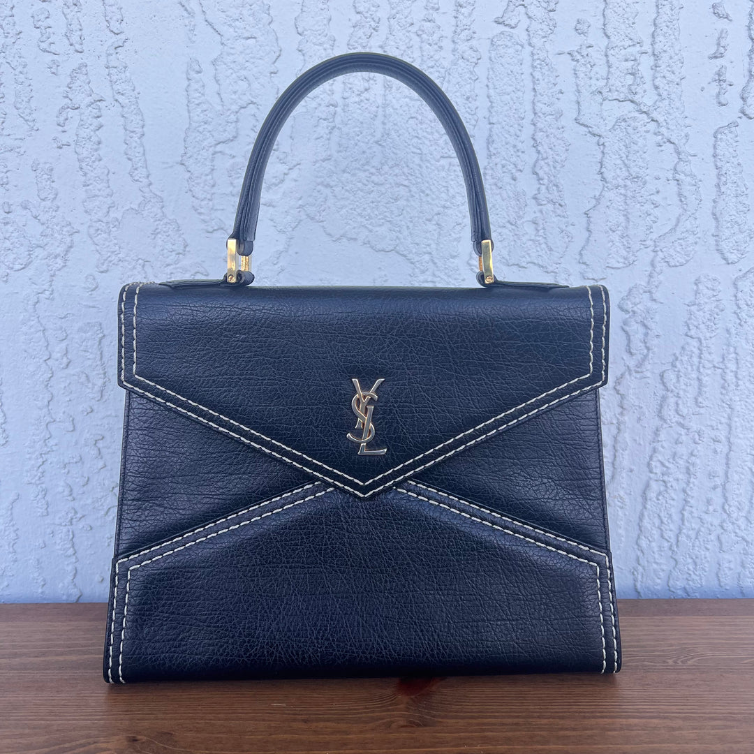 Saint Laurent Authenticated Cassandra Leather Handbag
